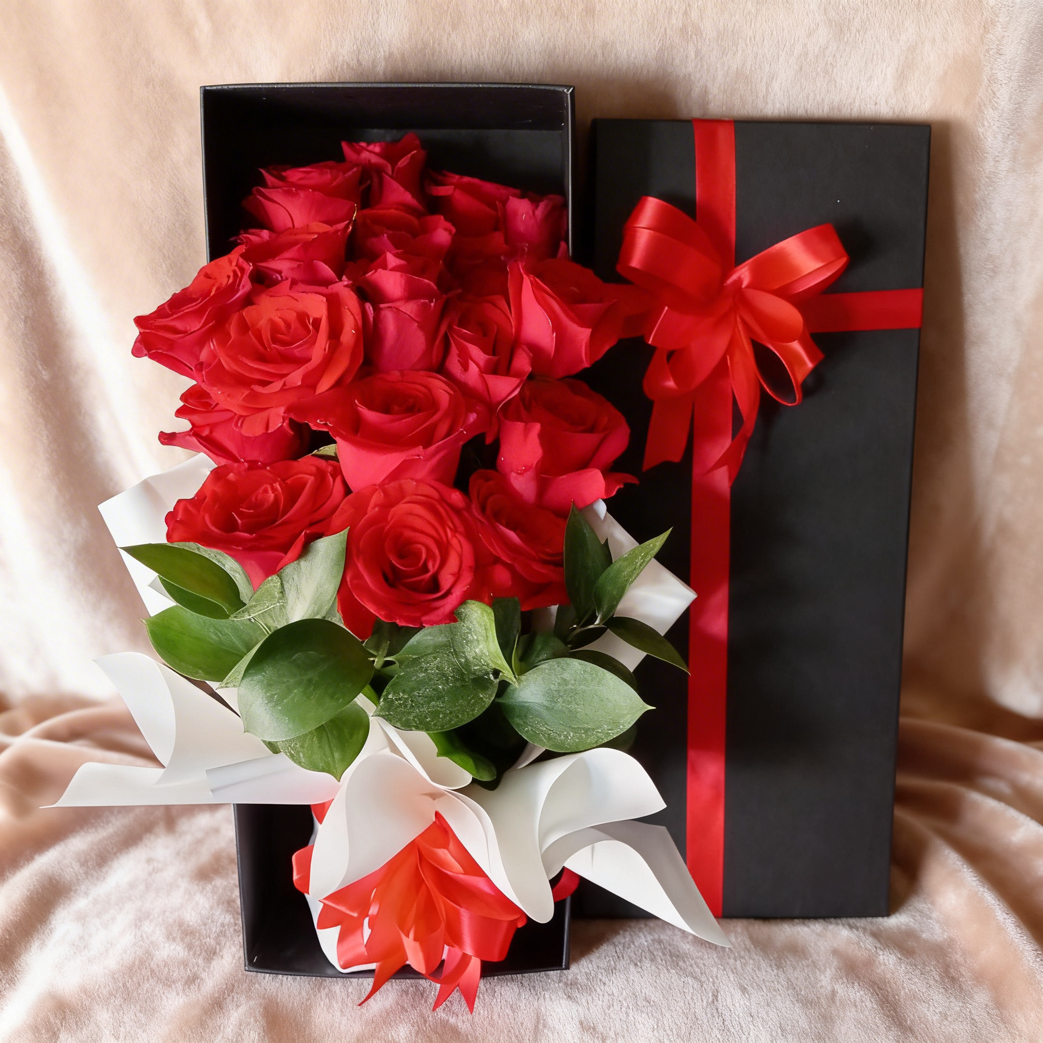 20 red roses arranged in a premium gift box with green fillers and decorative ribbon, romantic floral arrangement.