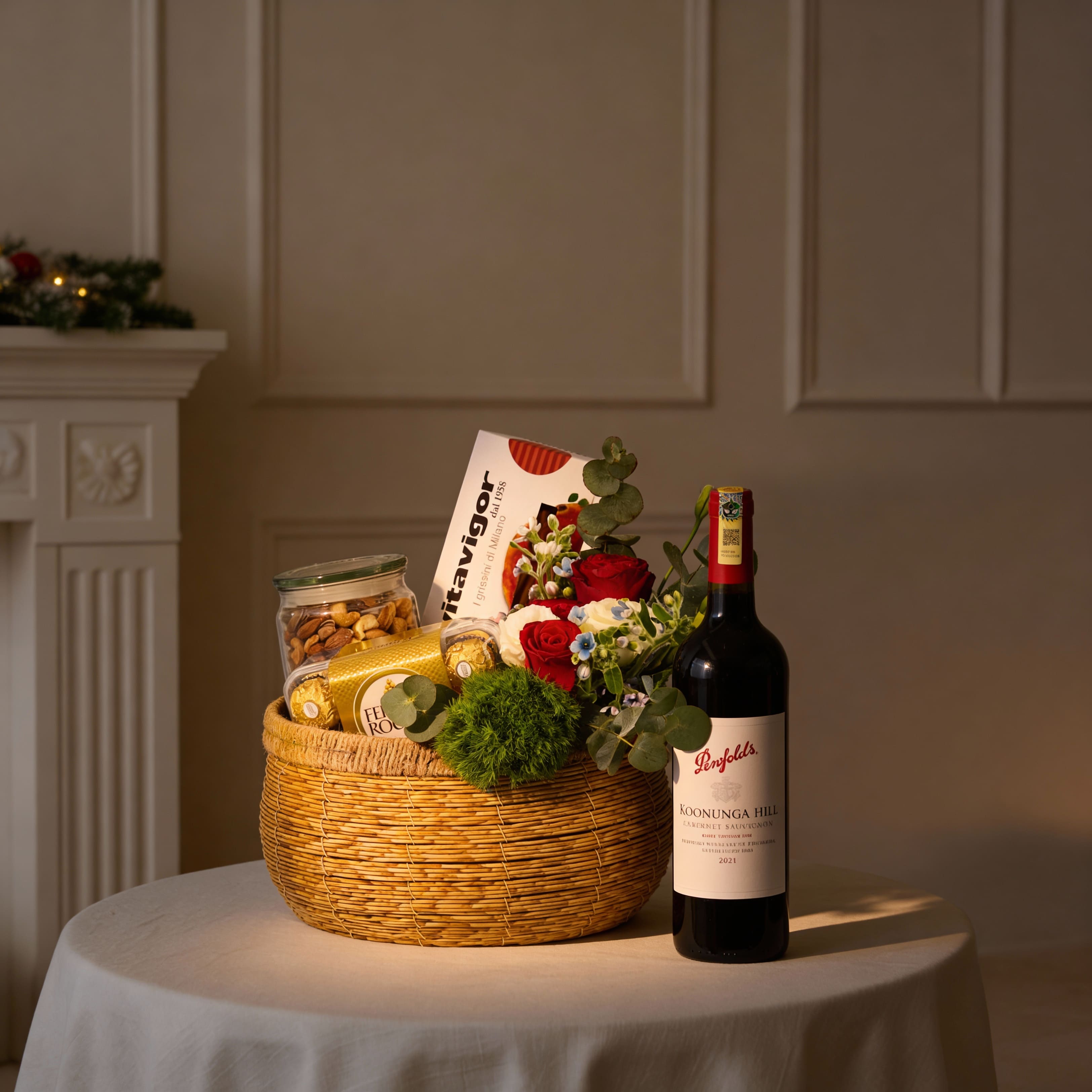 Holiday Harmony Basket with wine, Ferrero Rocher, biscuits, peanuts & red-white roses